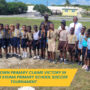 PE Teacher Deven Adderley celebrates with students from the inaugural Exuma Primary School Soccer Tournament as they proudly display their medals. The tournament brought together young players from across Exuma, creating lasting memories of teamwork and sportsmanship. 🏅⚽️