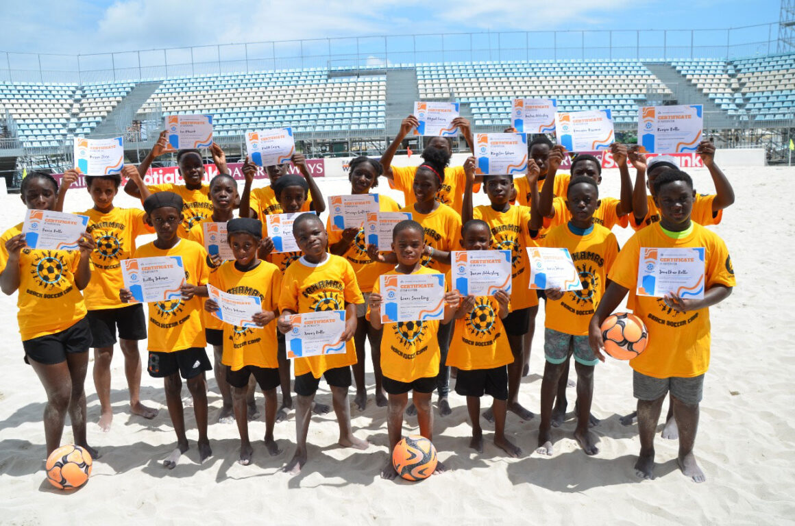 Campers proudly display their certificates